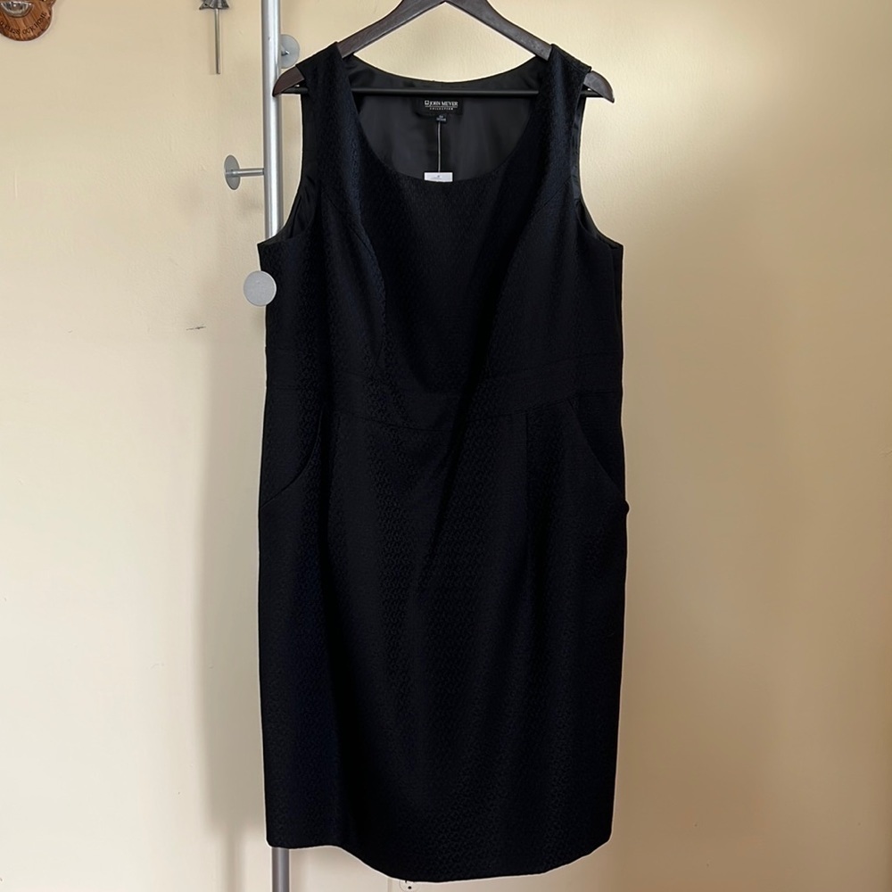Black dress with front pockets and 14in side zipper